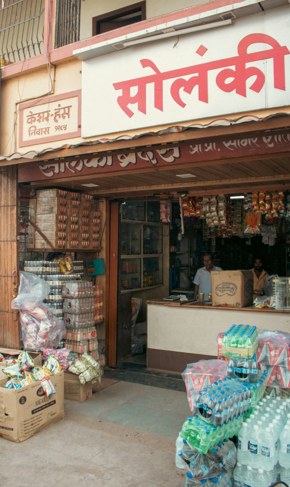 The counter of an Indian neighbourhood store, stock piled to the ceiling